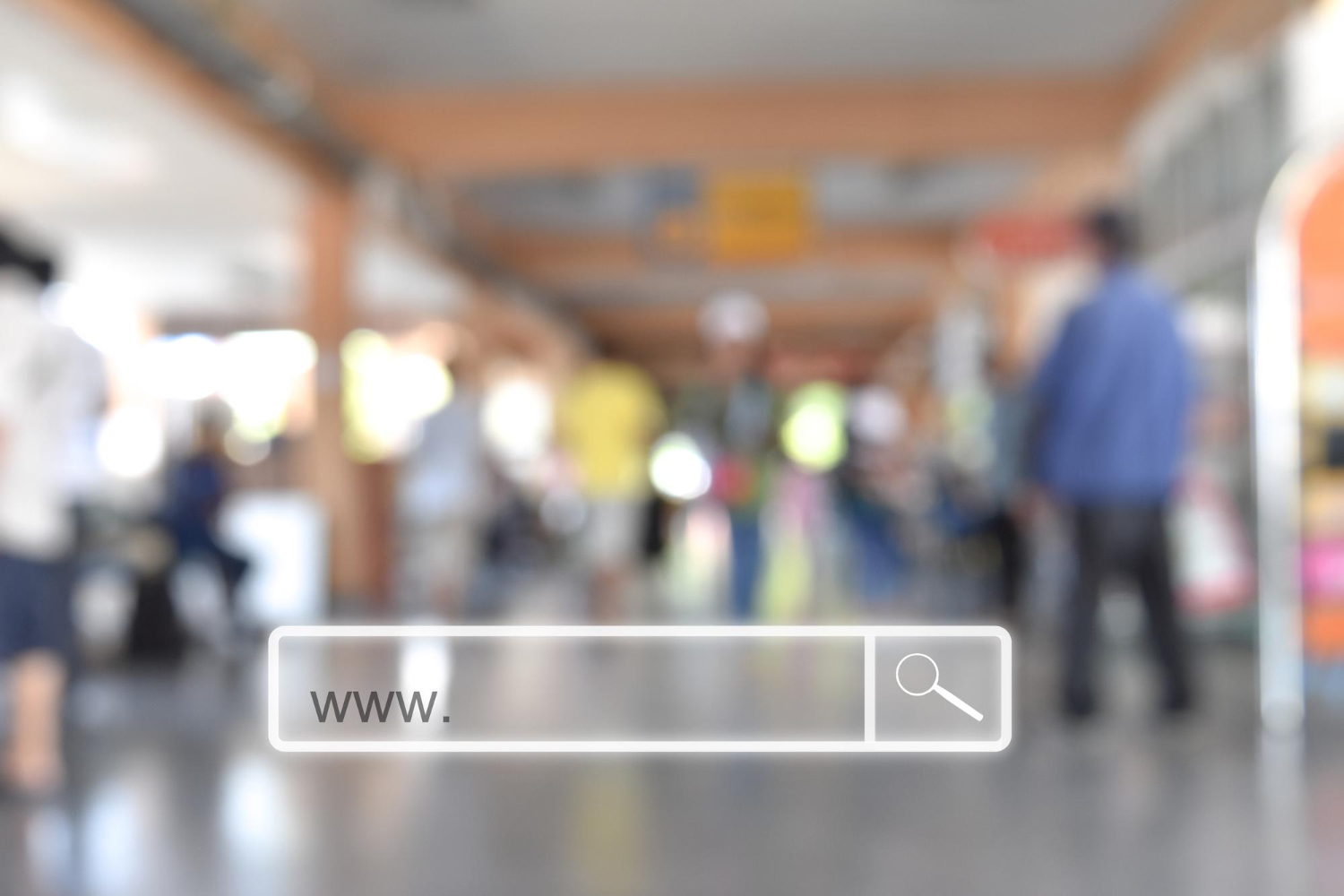 A web search bar over a blurred crowd of people, representing branded and non-branded search traffic